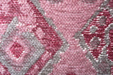 Pink, gray, geometric patterned, machine washable rug