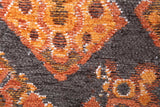 Orange, geometric patterned, machine washable rug
