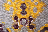 Yellow, gray, geometric patterned, machine washable rug