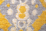 Yellow, gray, geometric patterned, machine washable rug