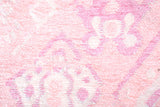 Pink, geometric patterned, machine washable rug