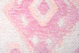 Pink, geometric patterned, machine washable rug
