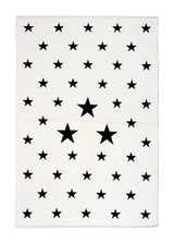 White, black, star patterned, machine washable rug for kids