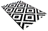Black and white, geometric patterned, machine washable rug