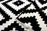 Black and white, geometric patterned, machine washable rug