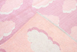 Pink, cloud patterned, machine washable rug for kids