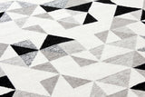 Black, gray, white, geometric patterned, machine washable rug