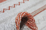 Washable Ethnic Patterned Rug in Orange and White Color