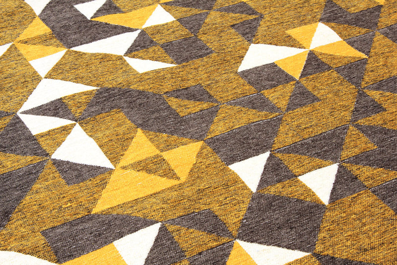 Yellow, gray, brown, geometric patterned, machine washable rug